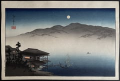 A Lakeside Inn Under Moonlight